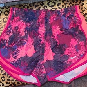 Bright magenta Nike running shorts. Buy One Get One Half